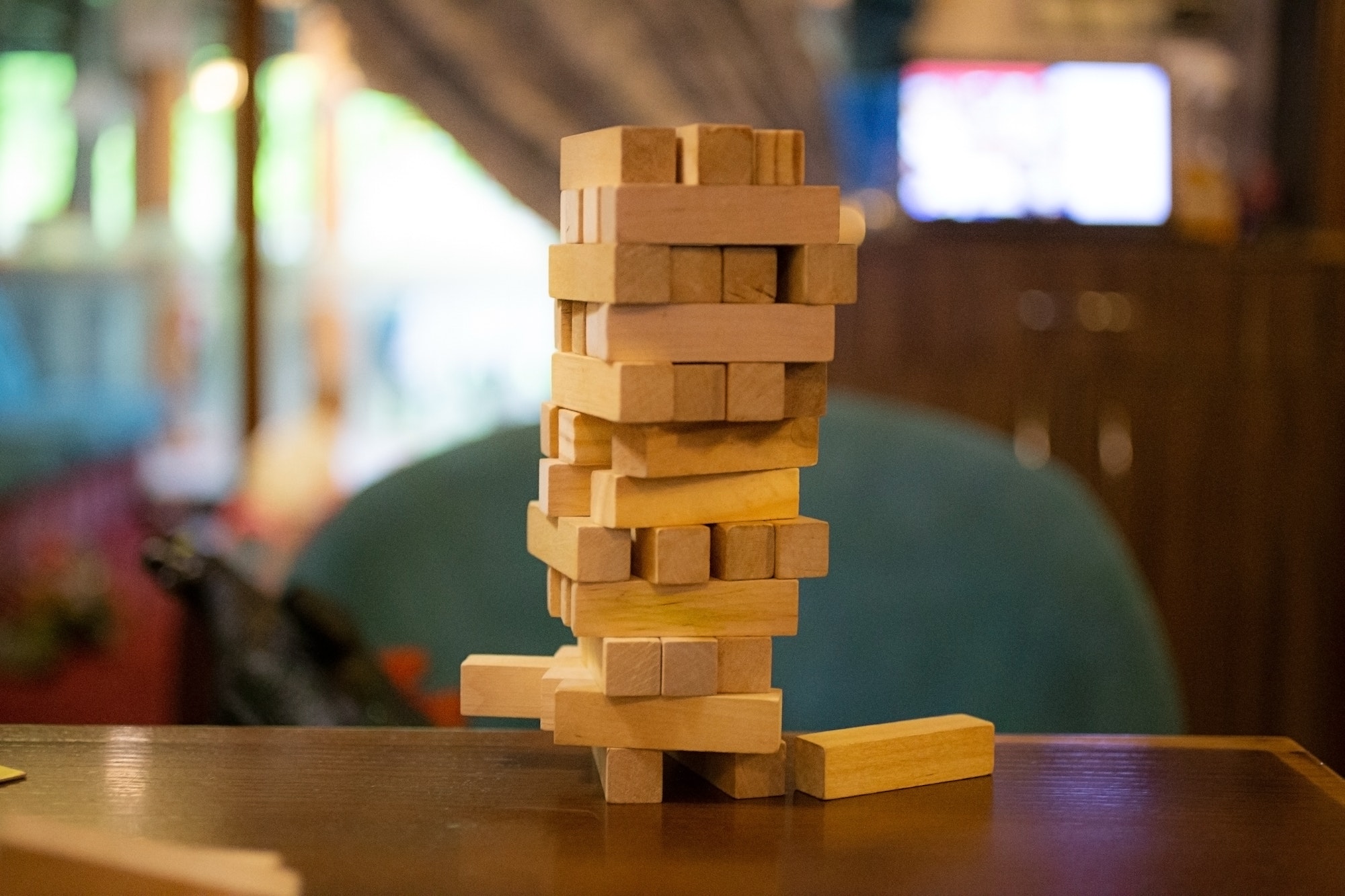 Construction from jenga building blocks. Board game for restaurants visitors. Construction from jenga building blocks. Board game for restaurants visitors.